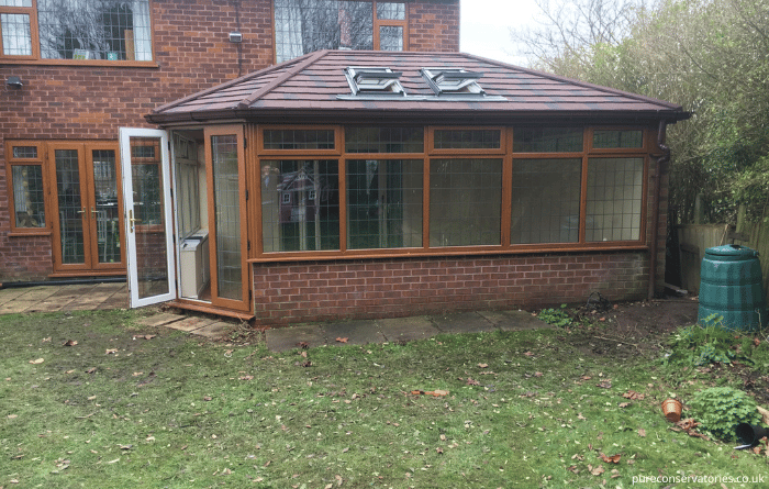 replacement with a solid conservatory roof